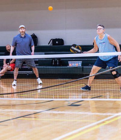 Two people play pickleball at the Pelham Recreation Center.