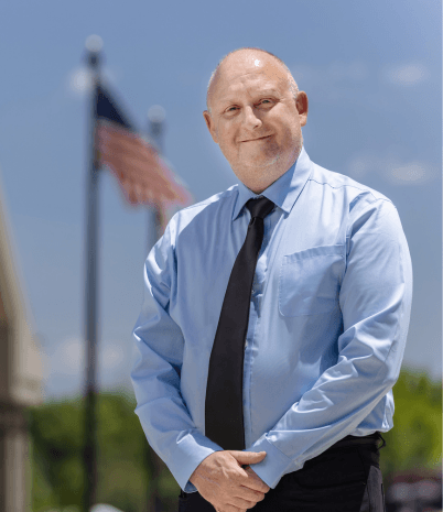 A headshot photo of Christian Newberry, Director of Skating at Pelham Civic Complex & Ice Arena.